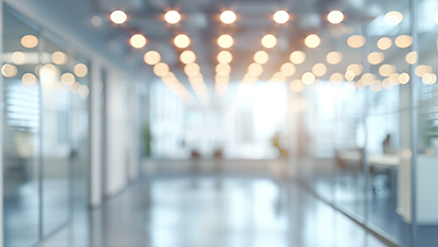 blurry image of an office hallway or lobby